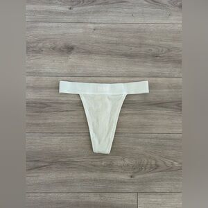 Skims Cotton Rib Thong Panties Logo Wide Band in Bone